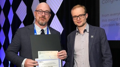 Nik Chekshin Receiving an Award